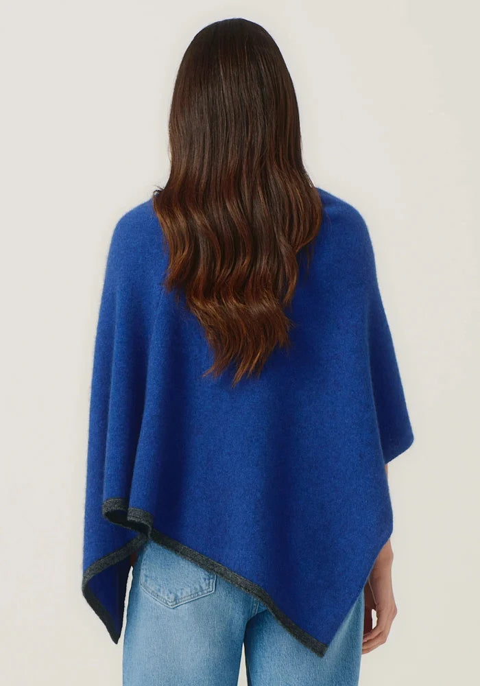 Possum and Merino

1623 Two Tone Poncho - A fan favourite, the Two Tone Poncho is a winner. With a relaxed fit and contrast coloured tipping it's cut for comfort and style. With a rainbow of colour options on offer, this is one you'll want in each colour! Classic fit.&nbsp;

Made in New Zealand from an exclusive Merinomink blend of 50% ZQ Merino, 40% Brushtail possum and 10% Mulberry silk.