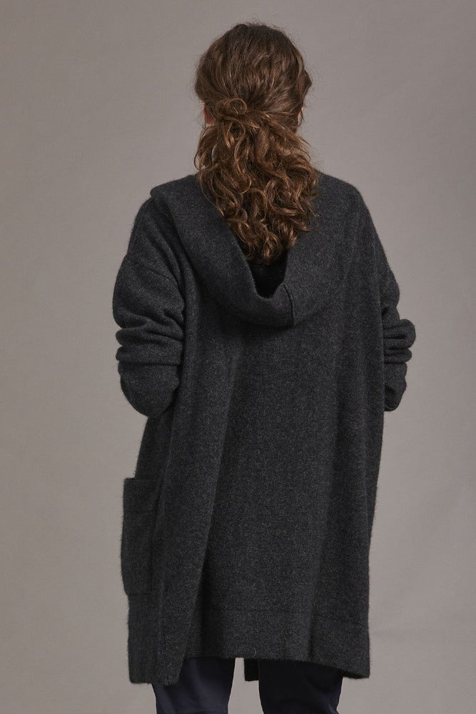 5013 Oversize Hood Jacket - Heavenly warmth and comfort, warmth and comfort, our Oversized Hood Jacket is ticking all the right boxes to become your new favourite overpiece of the season.  Mid weight Oversized Hood Two Front Pockets 35% Possum Fur, 55% Merino Wool, 10% Pure Mulberry Silk New Zealand designed and manufactured Generous Fit Natural and Sustainable