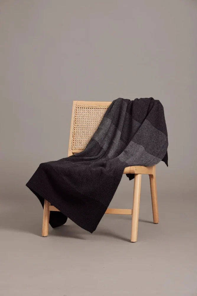 5020 Ombre Throw - Our beautiful Ombre Throw is perfect for keeping you warm both at home or when traveling! Featuring a tonal ombre pattern inspired by our best selling Ombre Poncho, this Possum Merino throw offers superior warmth, cosiness, and softness.