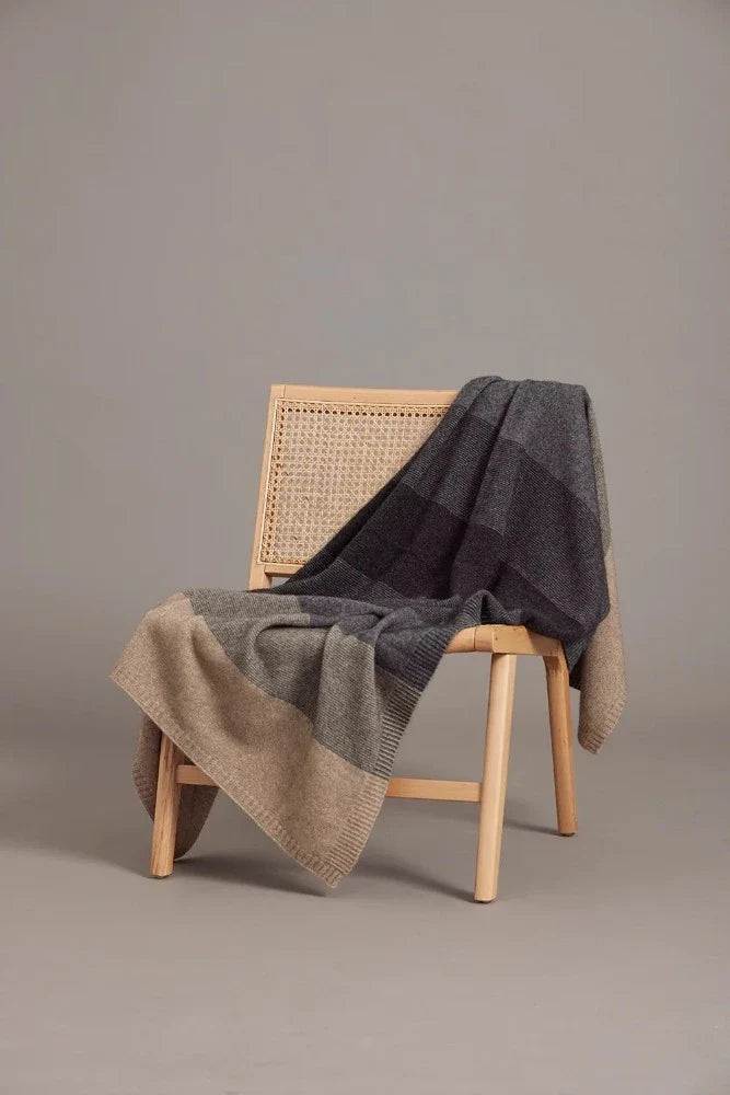 5020 Ombre Throw - Our beautiful Ombre Throw is perfect for keeping you warm both at home or when traveling! Featuring a tonal ombre pattern inspired by our best selling Ombre Poncho, this Possum Merino throw offers superior warmth, cosiness, and softness.