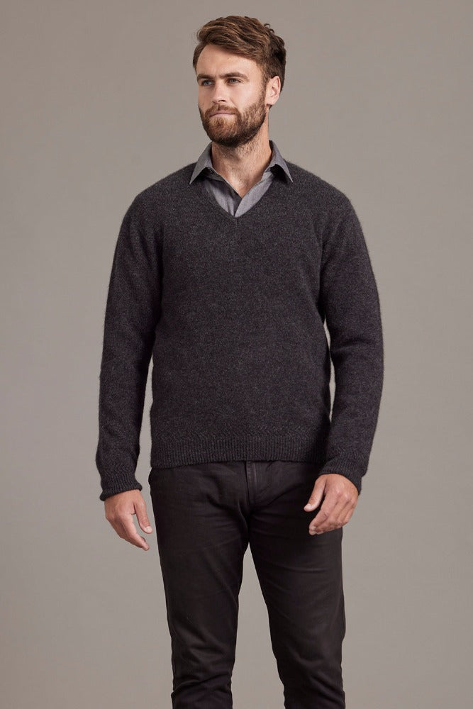Possum and Merino  6601 Rack Stitch V-Neck Jersey - Whether you’re out for the night or in the wild, this timeless V-neck jersey will get you through the elements in style. Nature’s finest natural fibres are brought together with quality workmanship for comfort and warmth. A V-neckline combines with feature rack-stitch waistband and cuffs to keep things effortlessly casual.