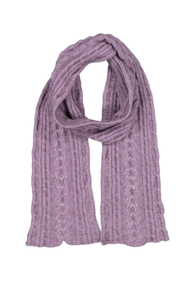 669 Cable Scarf - Feel the luxurious warmth as you wrap this beautifully soft scarf on your neck. Style by adding a touch of colour to your neutral outfit or toning down a bright outfit with your selection from our beautiful range of colours. McDonald NZ’s Possum Merino and Mulberry Silk Cable Scarf features the intricate detail of the cable knit structure. An essential accessory for every wardrobe.