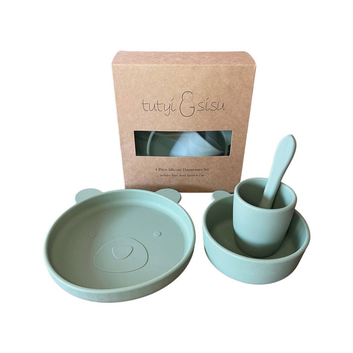 A 4 piece silicone suction dinnerware set in sage green color, including a suction plate, suction bowl, spoon, and cup, presented in a box.