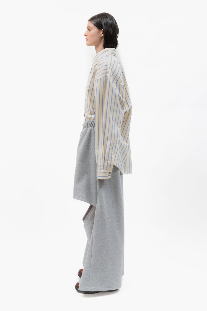 MANCANDY Deconstructed Sweatpants in grey heavyweight fleece featuring oversized wide legs, front cut-outs and extended length.