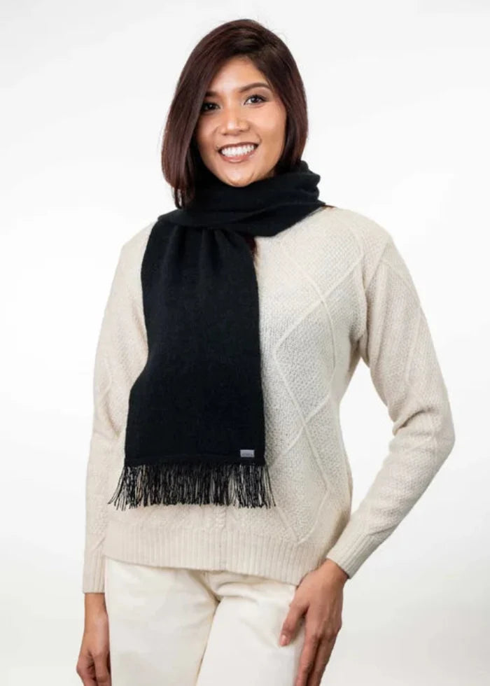 Possum and Merino  KO114 Scarf with Fringe -  A plain scarf with fringing which is generous in width and length.  Makes a set with KO159 Plain Beanie and KO48 Plain Gloves.  One Size - Approx. 22cm wide x 160cm long.  Made proudly in New Zealand from a premium blend of 40% possum fur, 50% merino lambswool & 10% mulberry silk.
