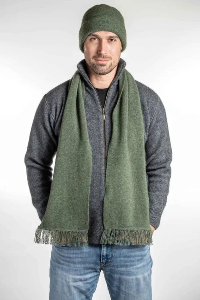 Possum and Merino  KO114 Scarf with Fringe -  A plain scarf with fringing which is generous in width and length.  Makes a set with KO159 Plain Beanie and KO48 Plain Gloves.  One Size - Approx. 22cm wide x 160cm long.  Made proudly in New Zealand from a premium blend of 40% possum fur, 50% merino lambswool & 10% mulberry silk.