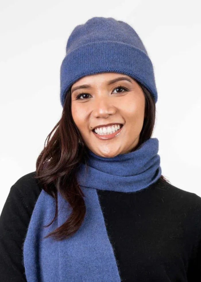 Possum and Merino  KO159 Plain Beanie - A plain, double layer beanie with a turned back edge and metal Koru badge.  Makes a set with KO114 Scarf with Fringe and KO48 Plain Gloves.   One Size.  Made proudly in New Zealand from a premium blend