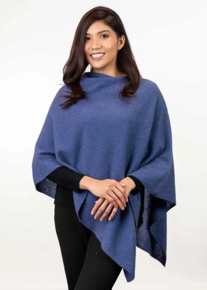 Possum and Merino  KO798 Two Way Poncho - This is a versatile and lightweight piece which can be worn two ways - with the hem either straight across or on the diagonal.   One Size   Made proudly in New Zealand from a premium blend of 40% possum fur, 50% merino lambswool & 10% mulberry silk.