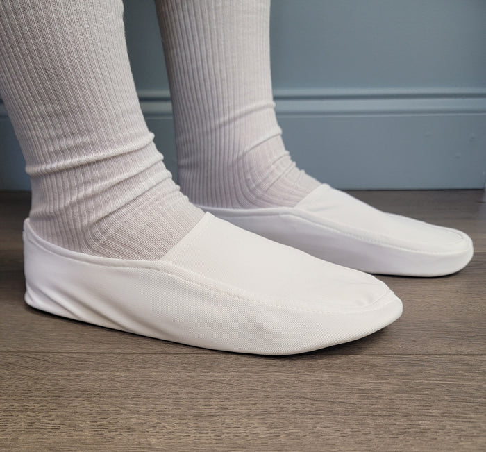 Plain white soft slippers for men.