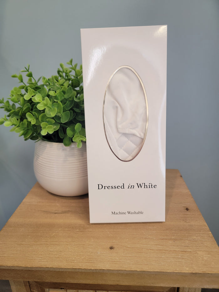 Plain white soft slippers for men in box.