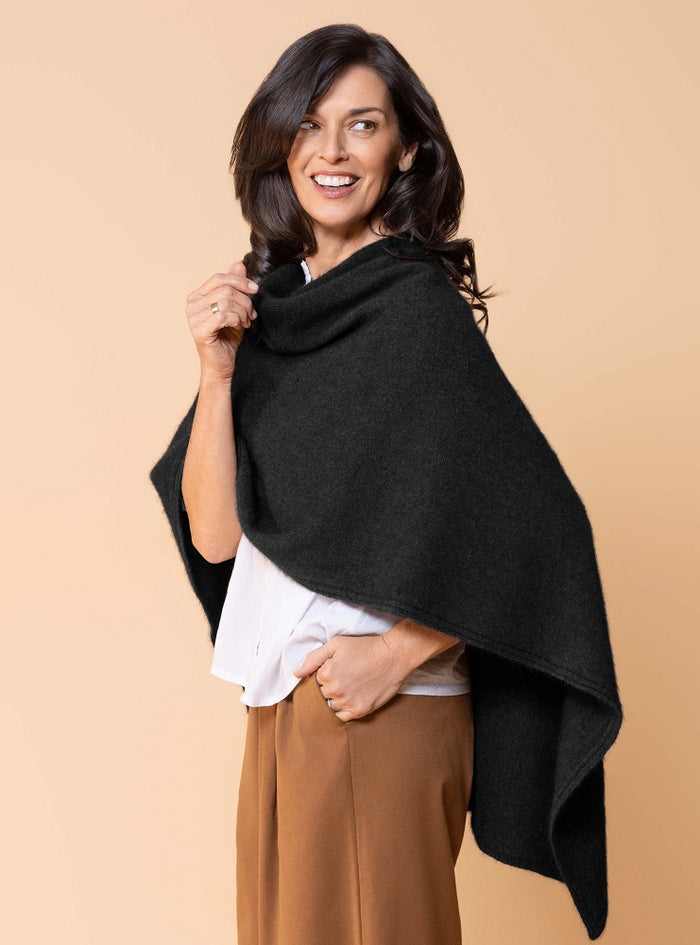 Possum and Merino.  NW3086 North Cape - Versatile cape designed to provide ultimate comfort and maximum freedom.  Single jersey construction, this garment can be worn numerous ways from a cape to knee rug and even a scarf.  Composition - 40% Possum Fur, 53% Merino, 7% Silk.  One Size.