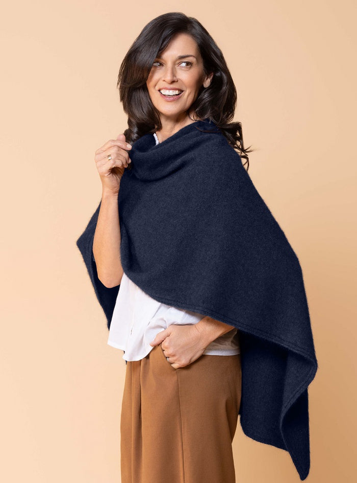 Possum and Merino.  NW3086 North Cape - Versatile cape designed to provide ultimate comfort and maximum freedom.  Single jersey construction, this garment can be worn numerous ways from a cape to knee rug and even a scarf.  Composition - 40% Possum Fur, 53% Merino, 7% Silk.  One Size.