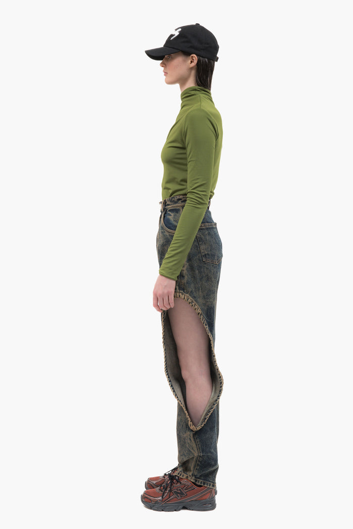 MANCANDY One Bite Jeans Dusty Blue in 100% cotton denim featuring a signature side cut-out, sculpted front pleat detail and embroidered back pocket logo.