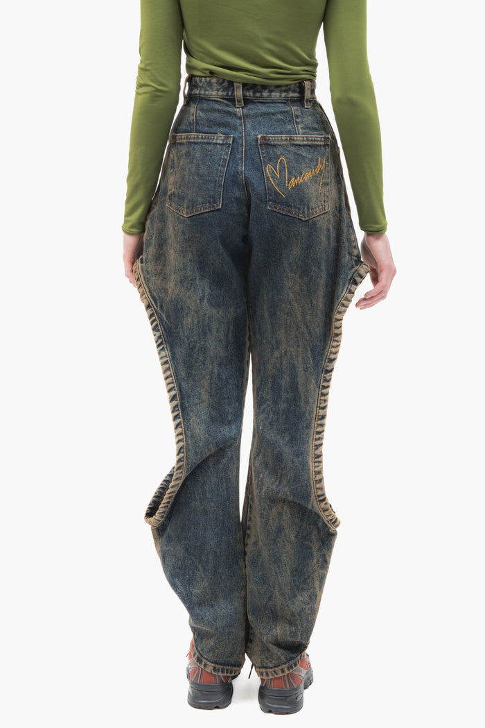 MANCANDY One Bite Jeans Dusty Blue in 100% cotton denim featuring a signature side cut-out, sculpted front pleat detail and embroidered back pocket logo.