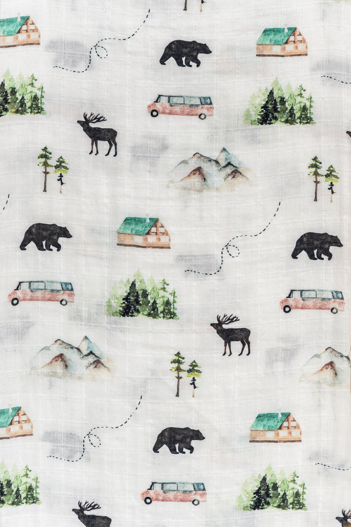Lightweight organic cotton swaddle with wilderness design