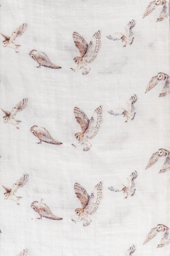 Lightweight organic cotton swaddle with owl print