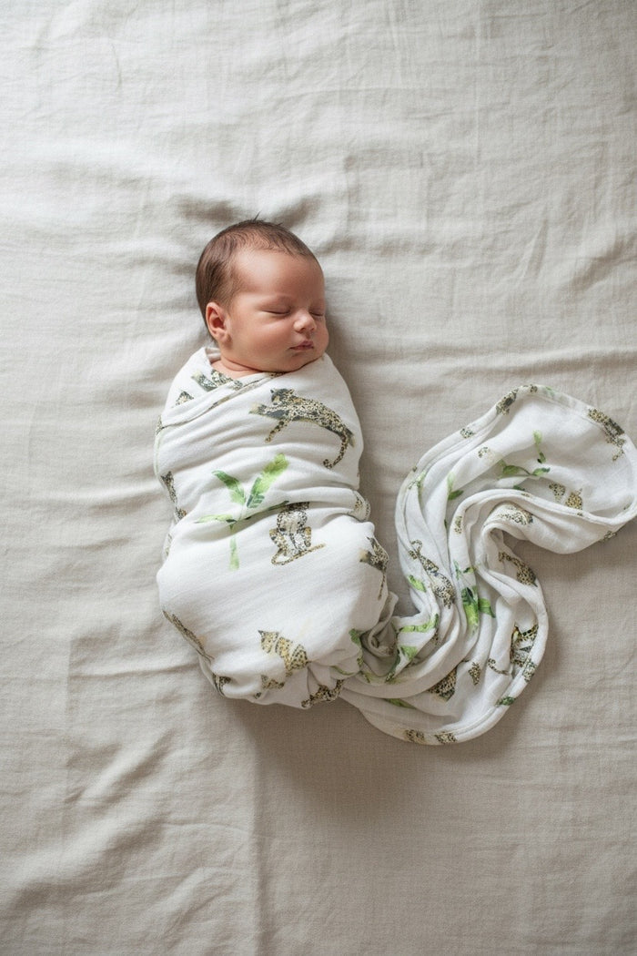 Organic cotton muslin swaddle wrap In The Jungle print