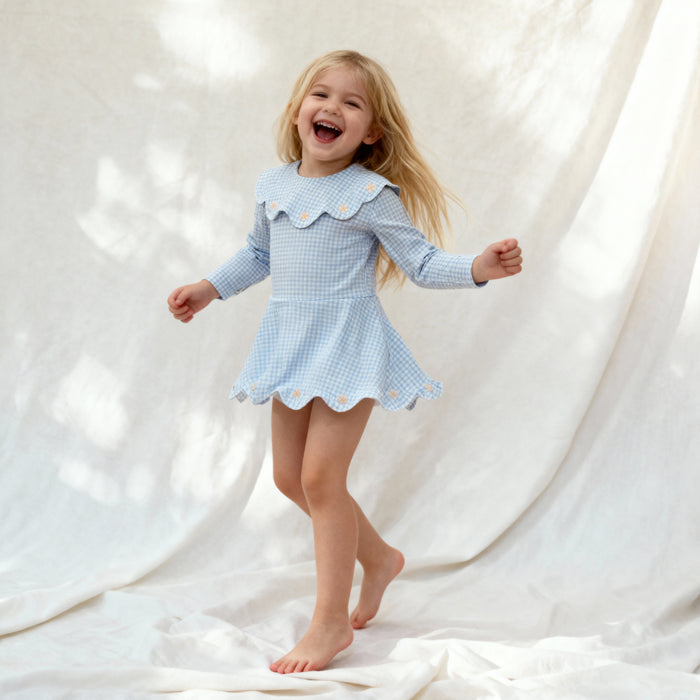 Petit Playa Petal Long Sleeve Swim Dress in Dorothy print, sun-safe UPF50+ swimwear for babies and girls