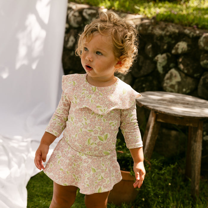 Petit Playa Petal Rashguard in Peony print, sun-safe UPF50+ swimwear for babies and girls — image 2