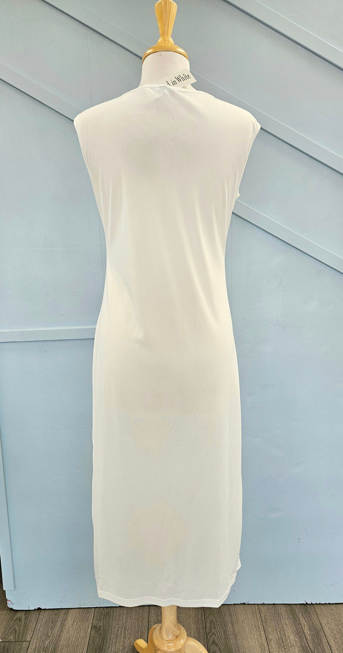 Raglan sleeve full length slip with pocket at hem.