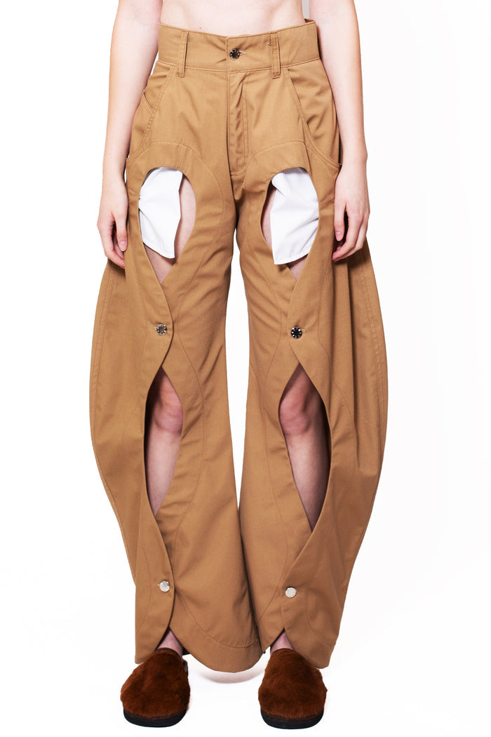 MANCANDY Rodeo Pants in cotton gabardine featuring buttoned front openings, contrasting patch pockets and a wide-leg silhouette.