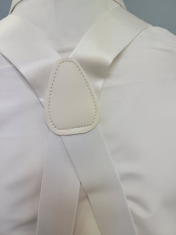 Back of white suspenders.